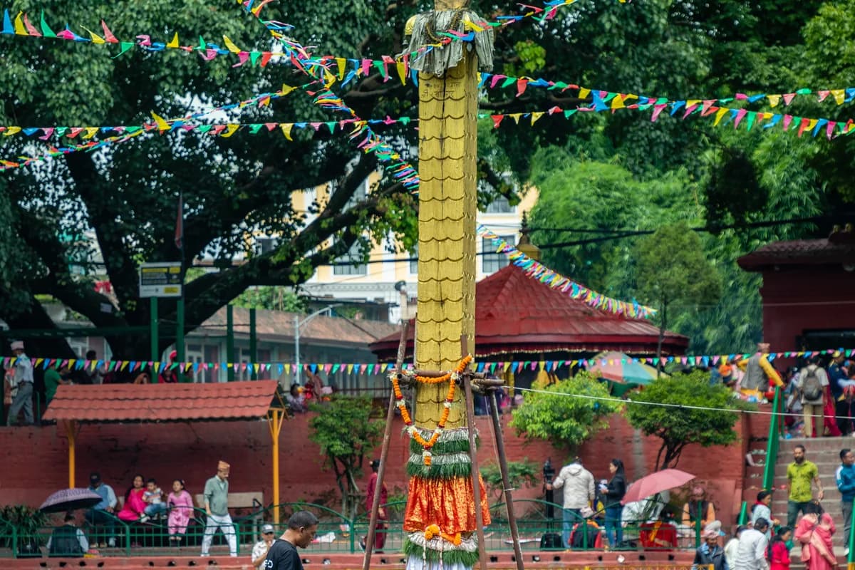 Devotees making sacred milk and flower offerings before consecrated serpent deity shrine