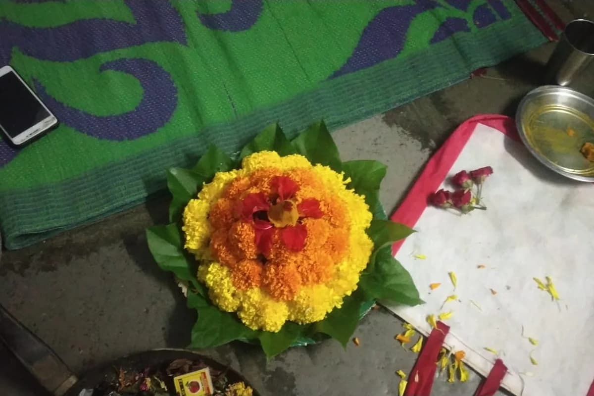 Grand pyramidical floral arrangement made with seasonal blossoms for Telangana Bathukamma